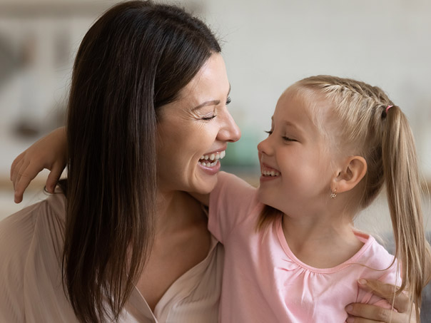 Mum and Child smiling at each other