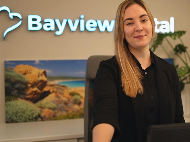 Smiling receptionist at Bayview Dental